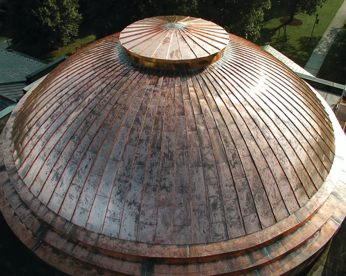 Craftsman Roofing crew installing a new roof in Porter